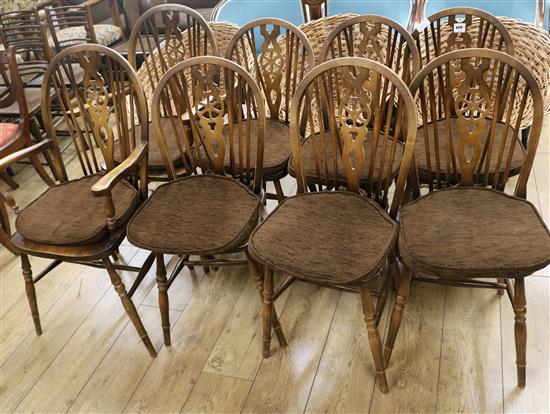 A set of eight beech wheelback chairs